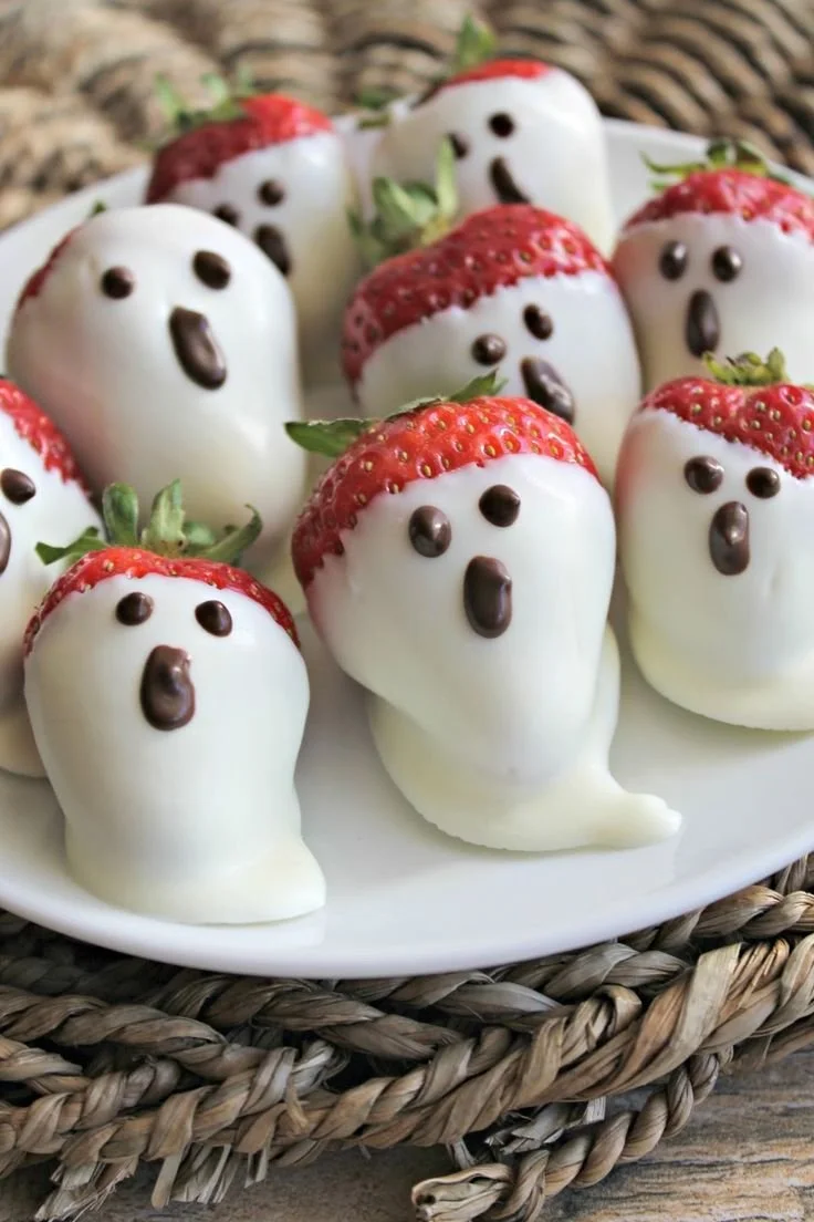 Spooky Halloween appetizers for a festive Halloween party table spread.