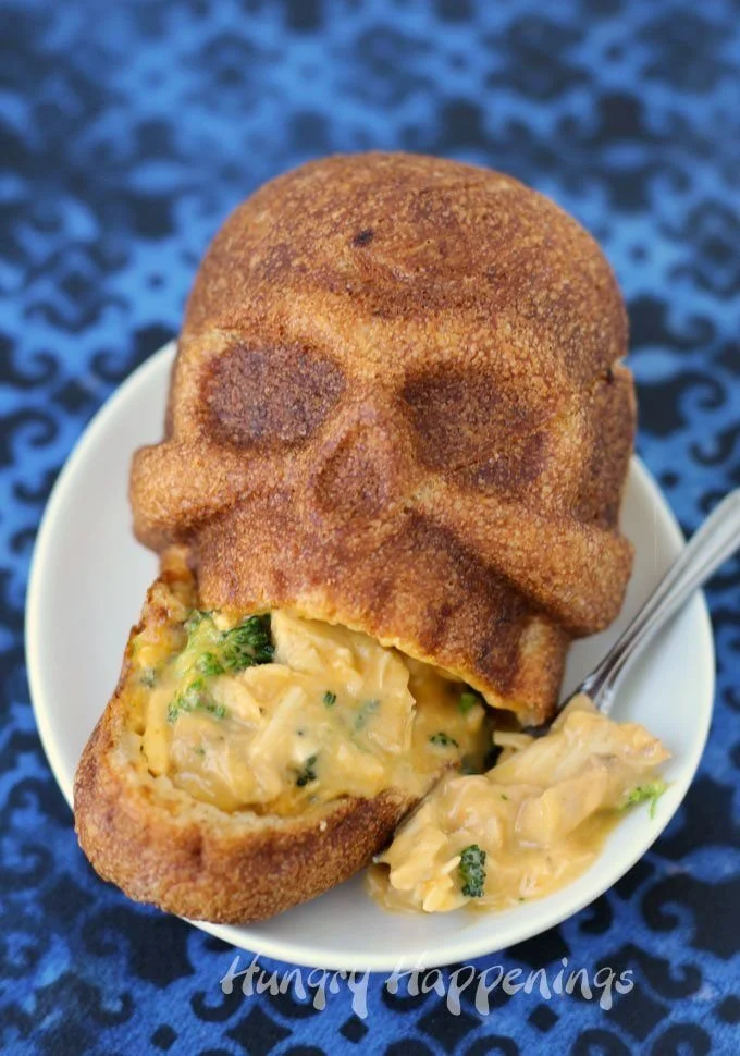 Cheesy broccoli and chicken stuffed skulls for Halloween parties