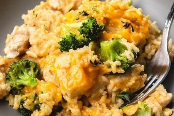 Delicious cheesy chicken and rice casserole baked to perfection