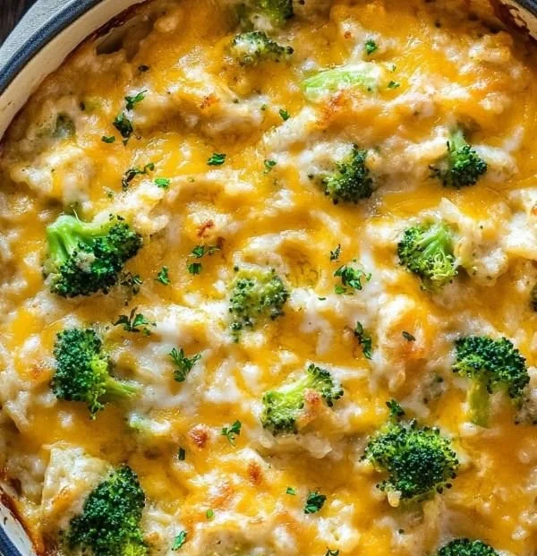 Creamy Chicken Broccoli Rice Cheese Casserole served in a baking dish