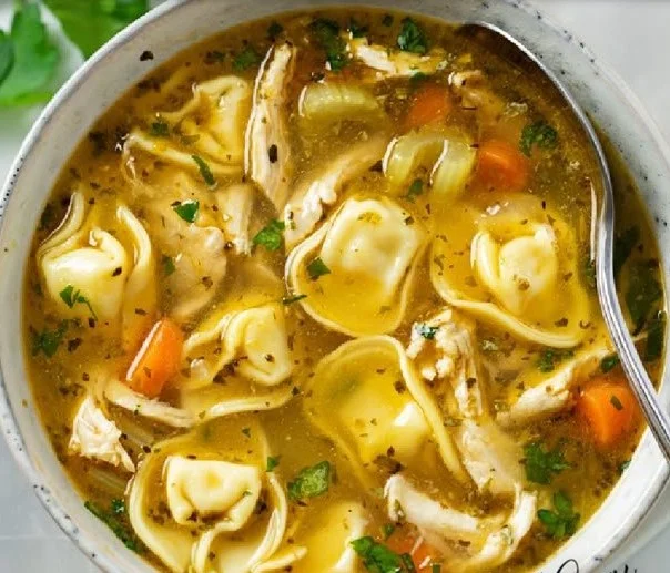 Delicious bowl of Chicken Tortellini Soup with fresh ingredients