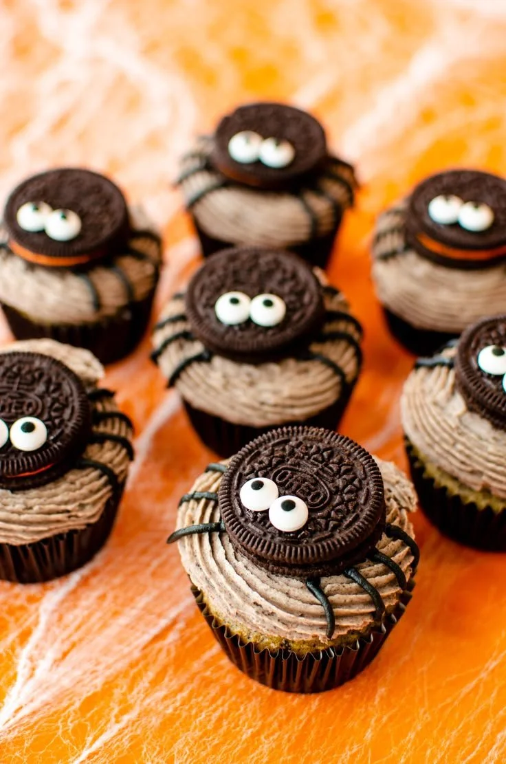 Halloween-themed spider cupcakes topped with chocolate spiders