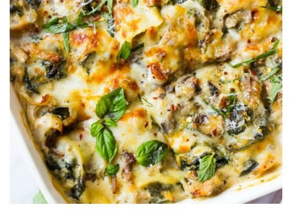 Creamy chicken mushroom spinach lasagna dish
