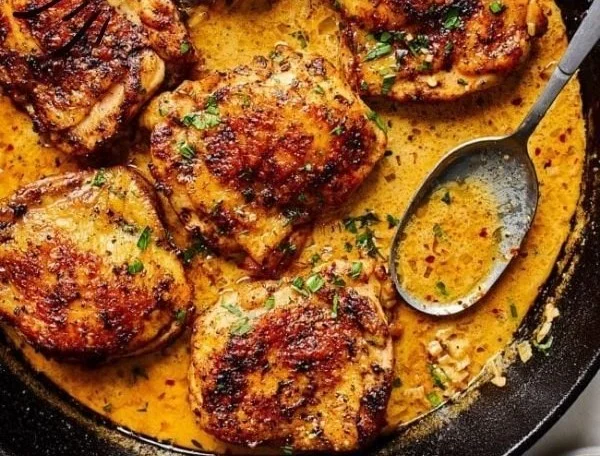 Delicious easy skillet chicken thighs cooked to perfection in a frying pan