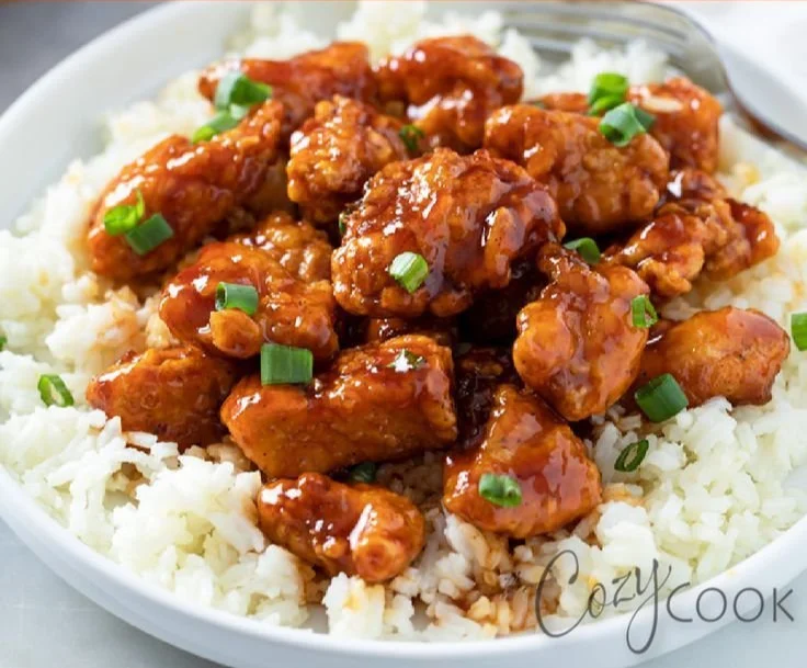 Delicious Firecracker Chicken plated with vibrant vegetables