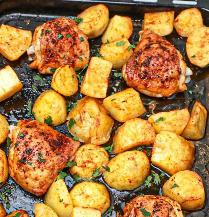 One pan chicken thighs and potatoes dish ready to serve.