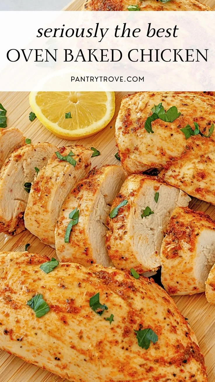 Juicy oven baked chicken breast served on a plate with herbs and spices