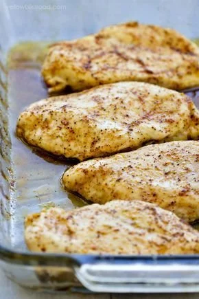 Delicious oven baked chicken breasts marinated and ready to serve.