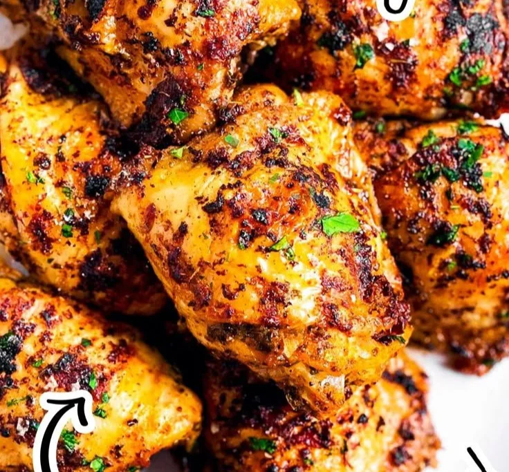 Perfectly cooked oven baked chicken thighs served on a plate
