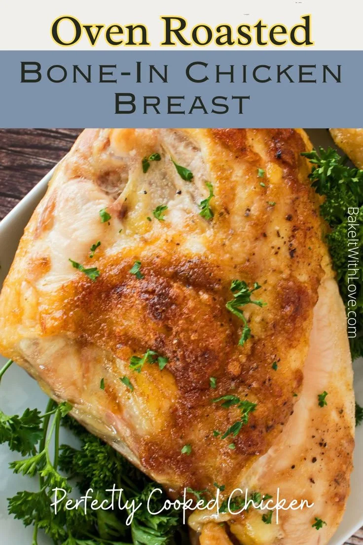 Oven roasted bone-in chicken breast served on a platter with herbs and spices