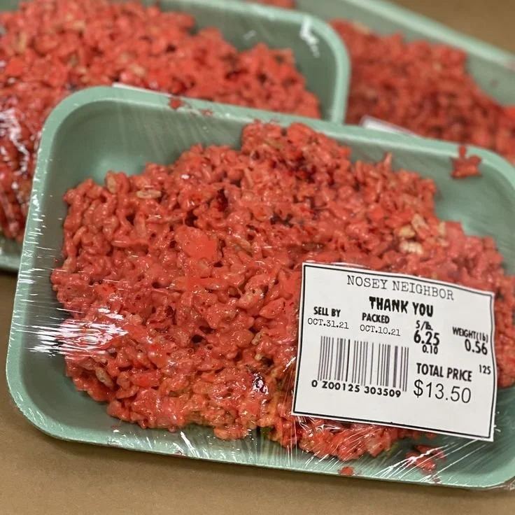 Spooky Halloween rice crispy treats resembling raw meat for a festive party