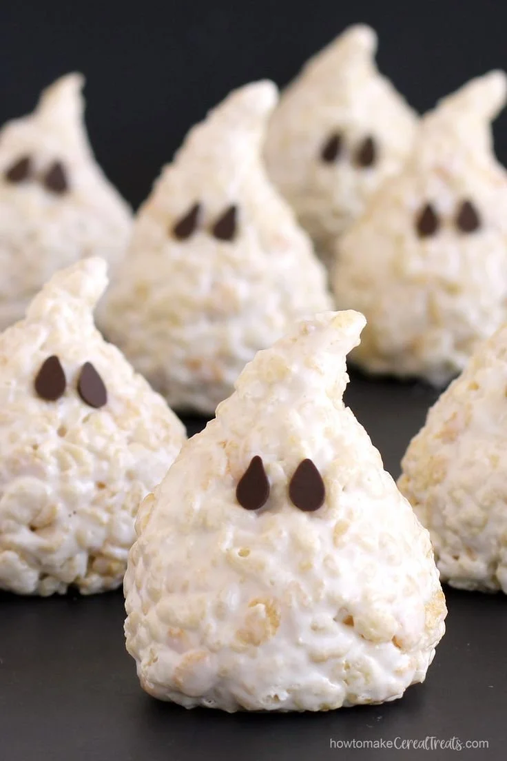 Spooky Rice Krispie Treat ghosts decorated for Halloween