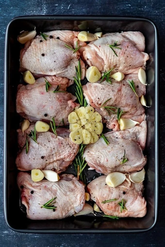 Delicious simple roasted chicken pieces garnished with herbs
