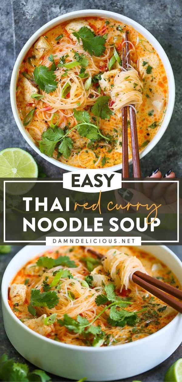 Bowl of vibrant Thai red curry noodle soup with fresh ingredients and herbs