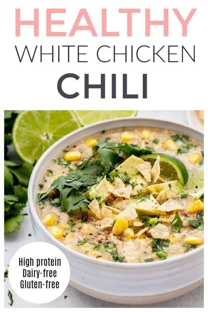 Bowl of delicious slow cooker white chicken chili topped with salsa verde
