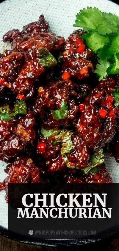 Plate of Chicken Manchurian with sticky sauce, garnished with green onions.