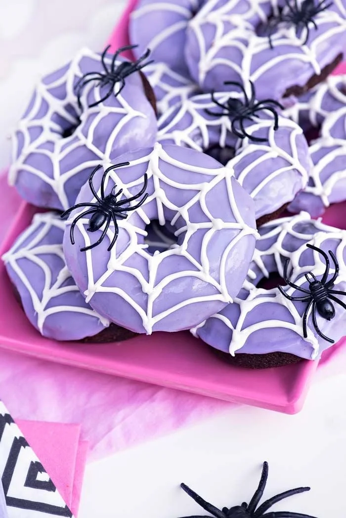 Chocolate Spider Web Doughnuts decorated with a spooky design for Halloween