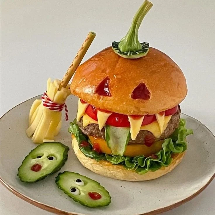 Delicious hamburger topped with cheese and pickles, ideal for Halloween meals.