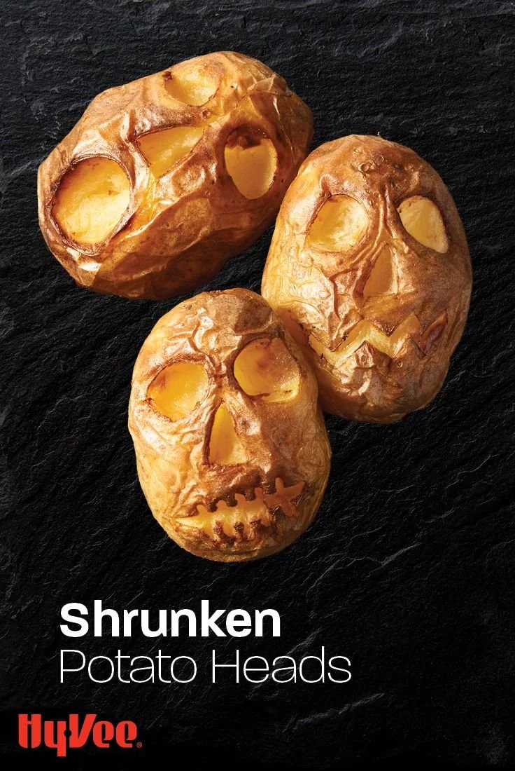Shrunken Potato Heads Halloween decorations for a spooky theme.