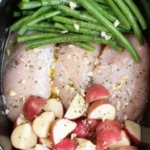 slow cooker seasoned chicken potatoes and green 2026 08 06 184016 512x1024 1
