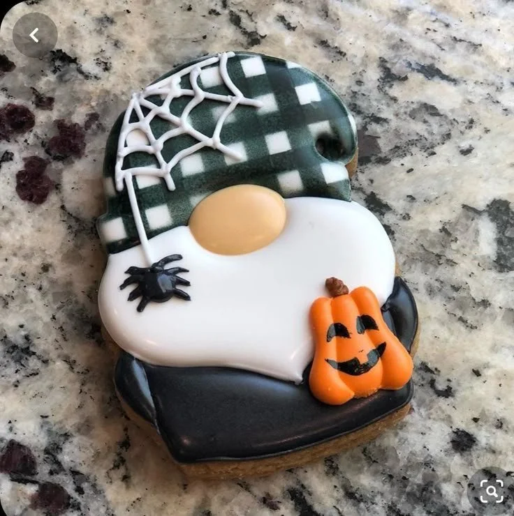 Spooky Halloween cookies with black and white plaid design for party treats