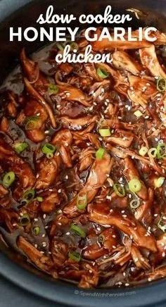 Slow Cooker Honey Garlic Chicken served in a bowl with rice and vegetables