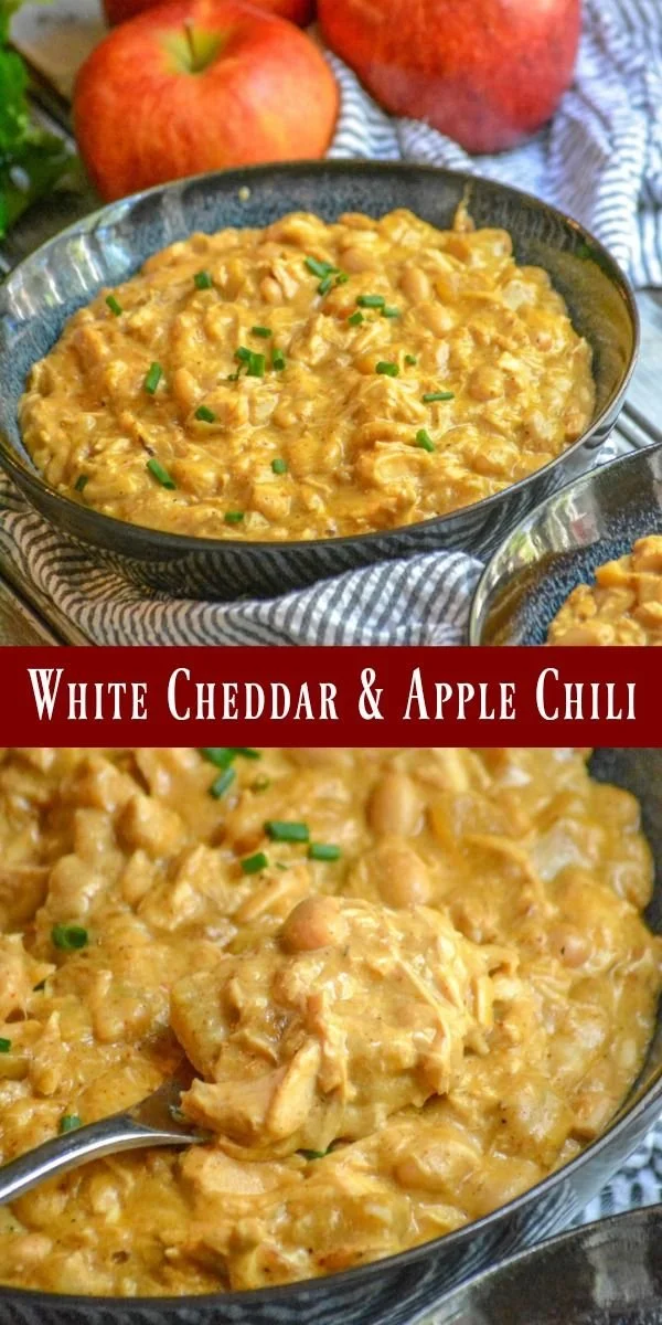 Bowl of creamy white cheddar chicken chili with apple slices on top